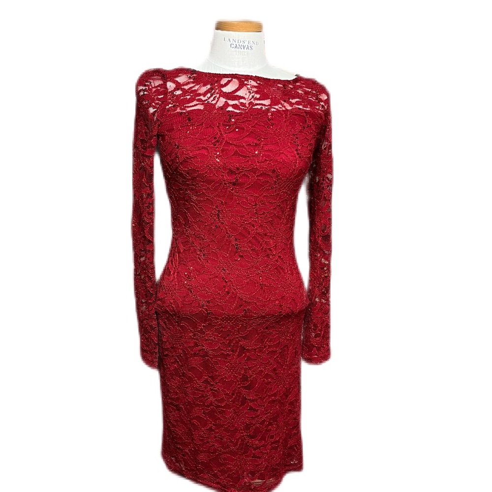 red dress with lace sleeves.